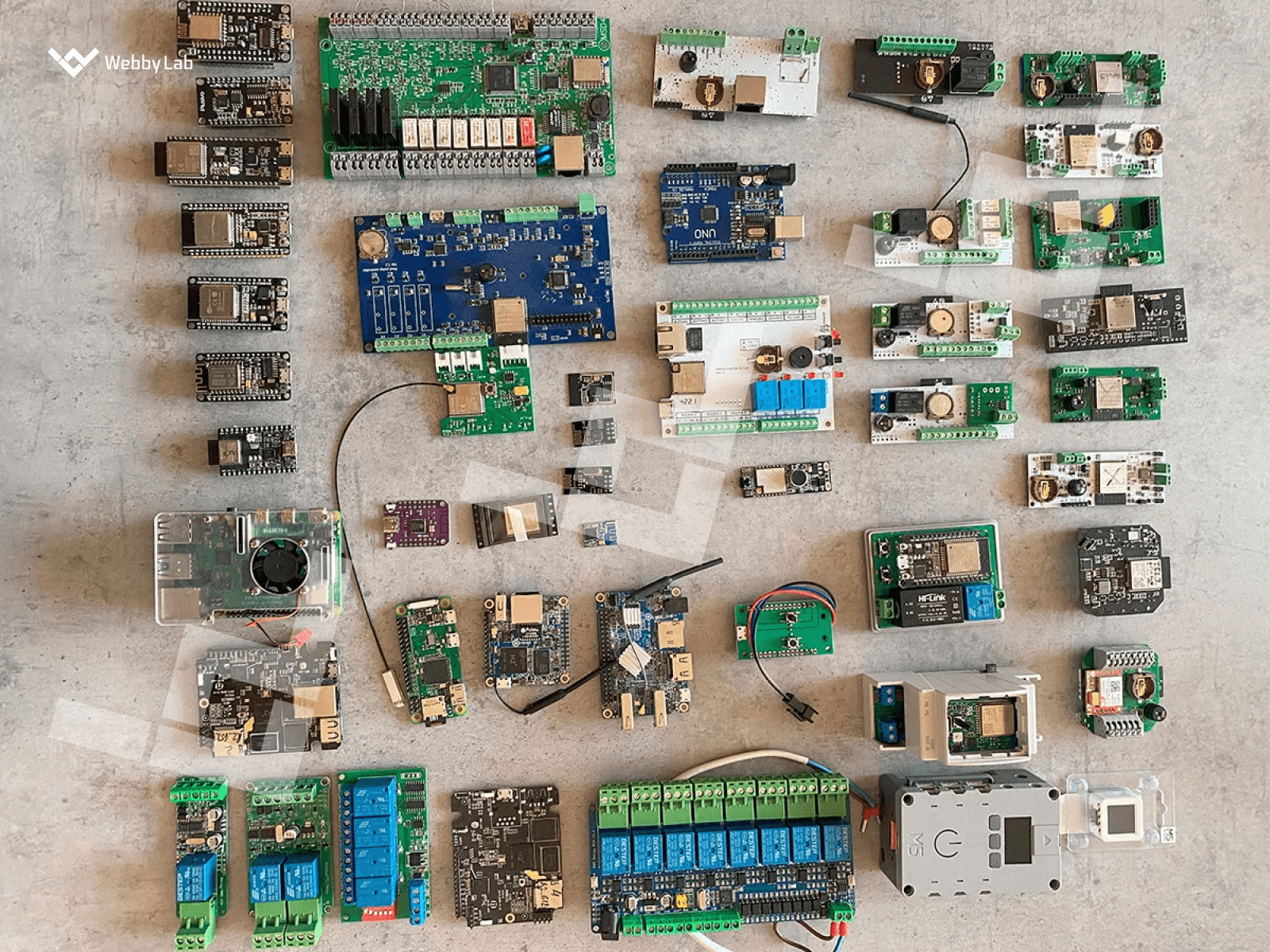 The selection of various circuit boards tested/made by WebbyLab, with Propuskator controllers among them